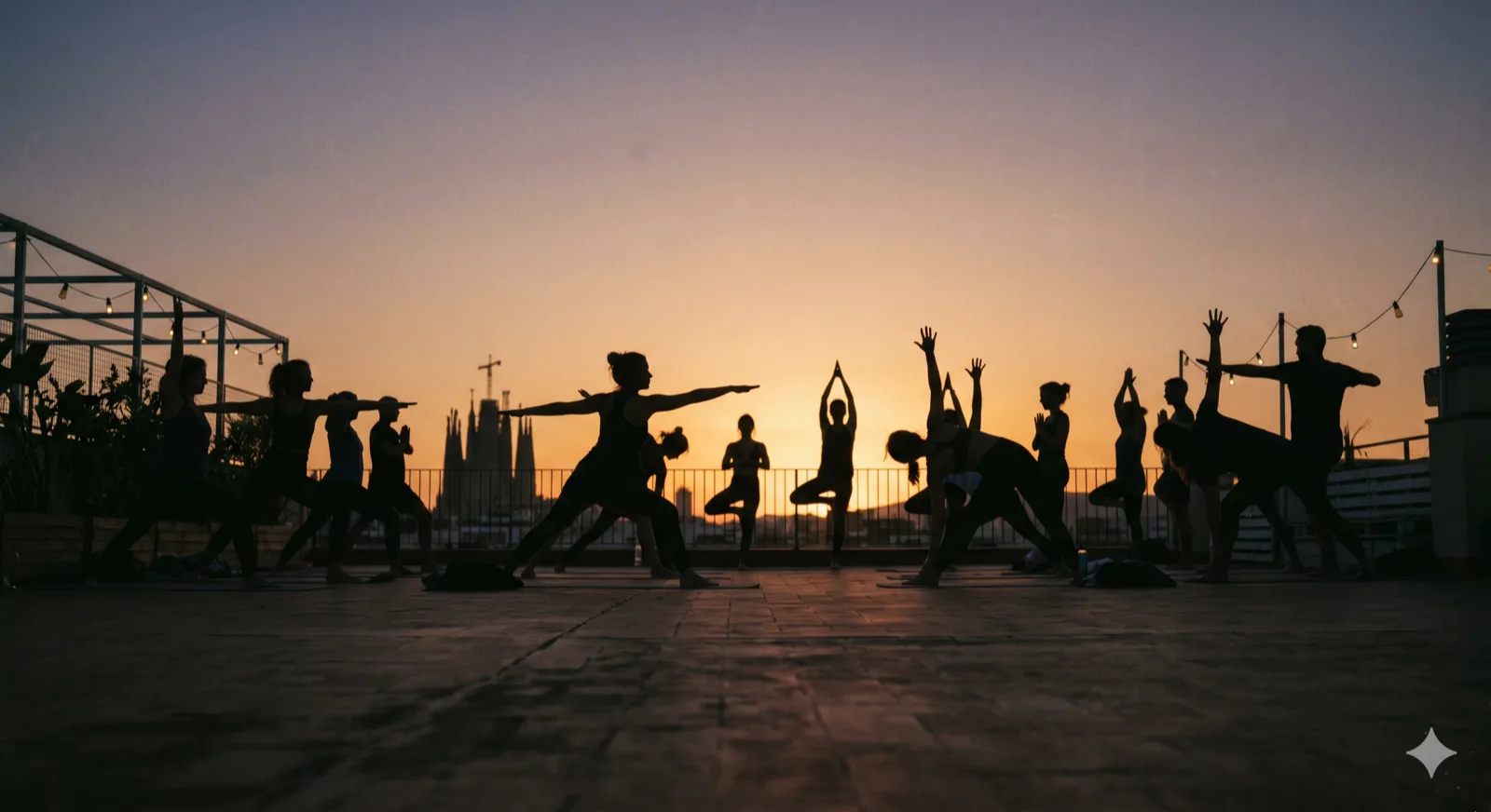 Yoga class at sunset on a rooftop